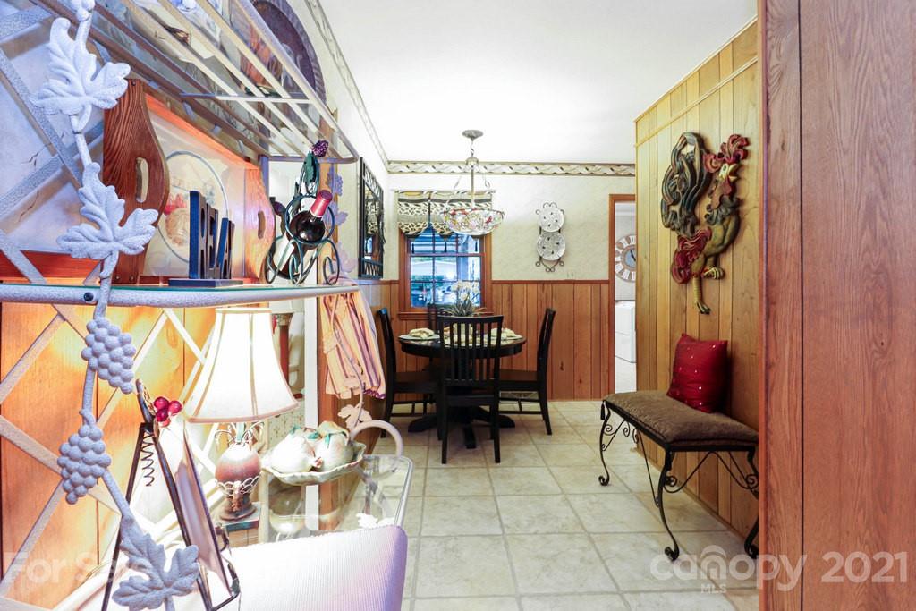 294 Holiday Road Lancaster, SC 29720 - Photo 26 of 48 a view of a dining room with furniture and wooden floor