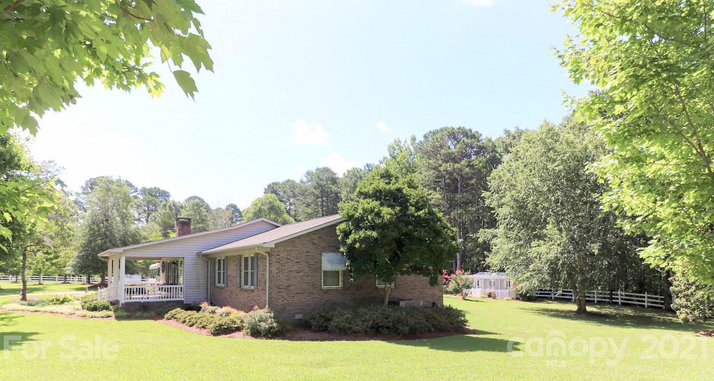 294 Holiday Road Lancaster, SC 29720 - Photo 4 of 48 a view of a house with a swimming pool