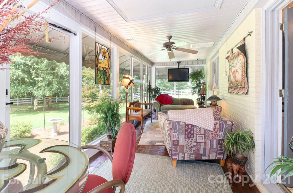 294 Holiday Road Lancaster, SC 29720 - Photo 34 of 48 a living room with furniture fireplace and a large window