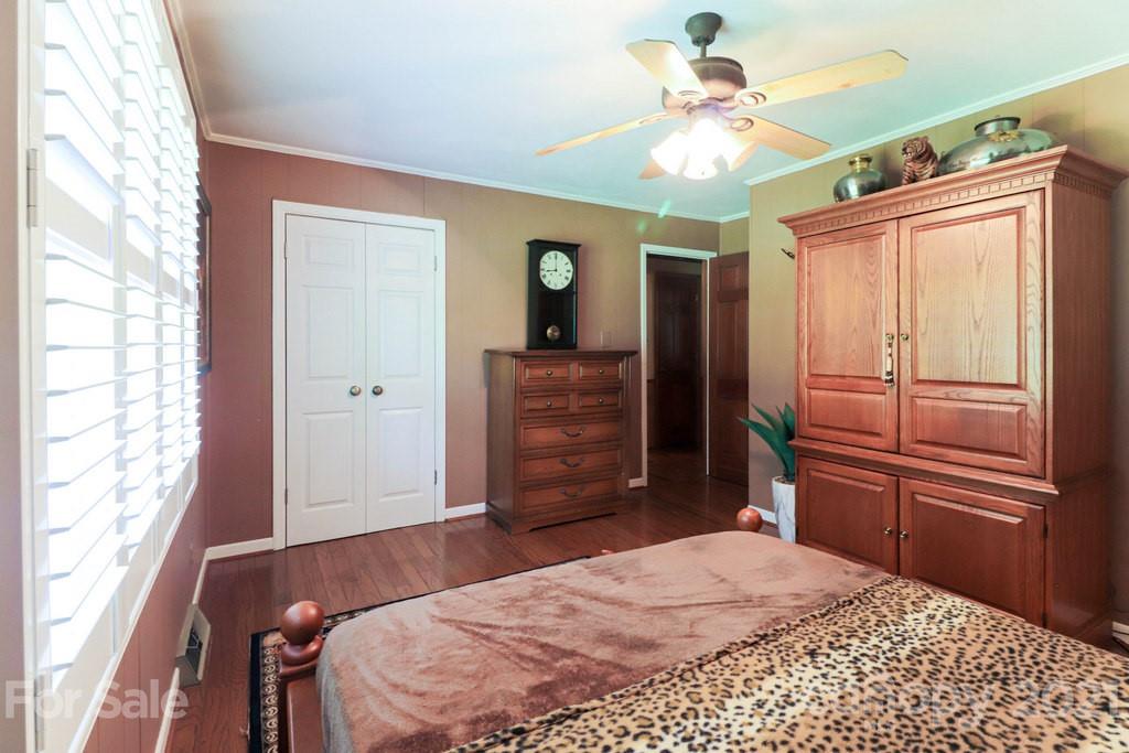 294 Holiday Road Lancaster, SC 29720 - Photo 45 of 48 a bedroom with a bed and a dresser