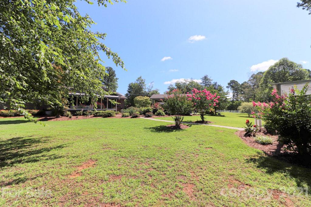 294 Holiday Road Lancaster, SC 29720 - Photo 7 of 48 a view of a garden with an outdoor space