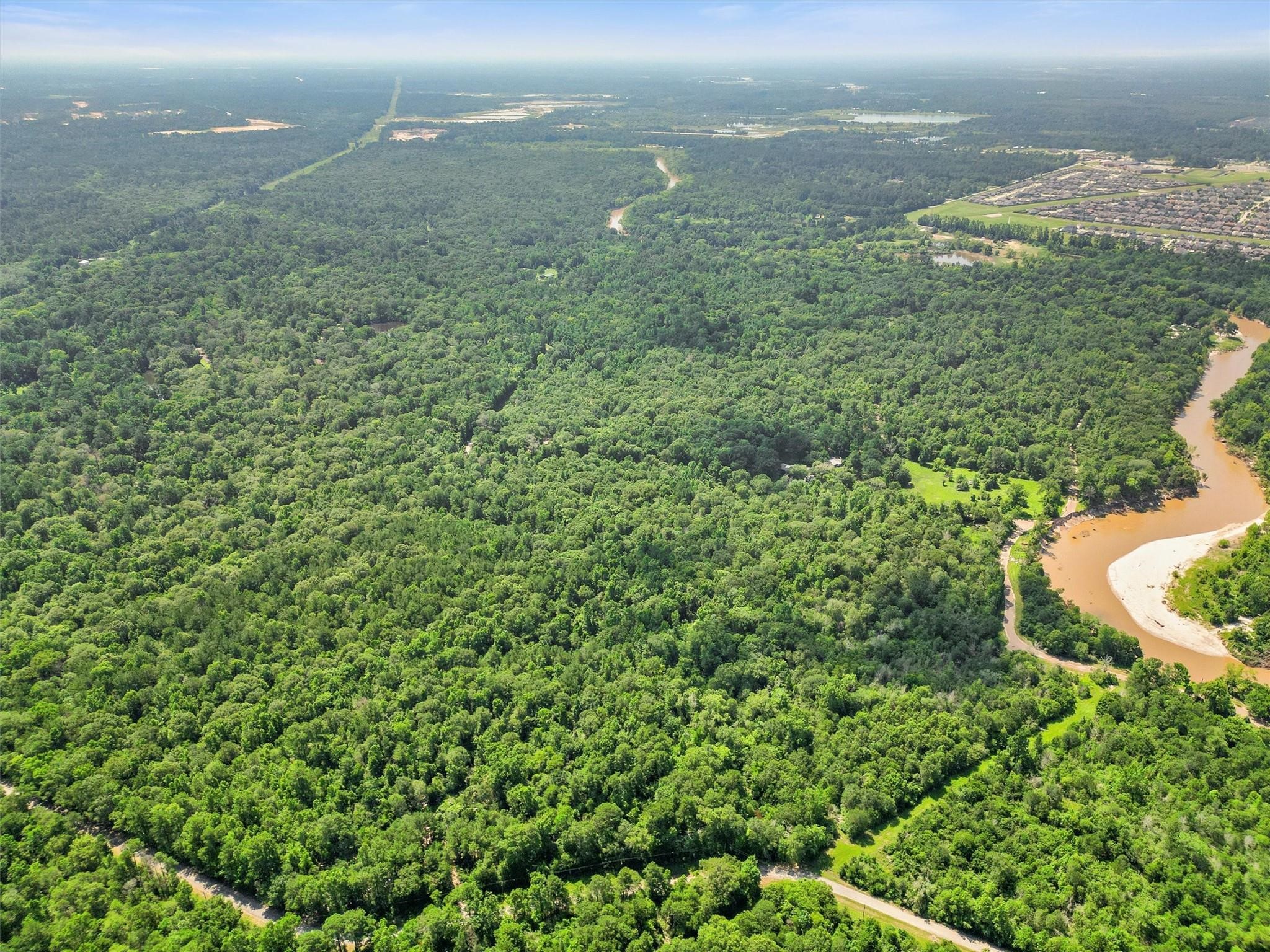 02 Tbd Block Conroe, TX 77302 - Photo 5 of 8 a view of a field with an ocean view