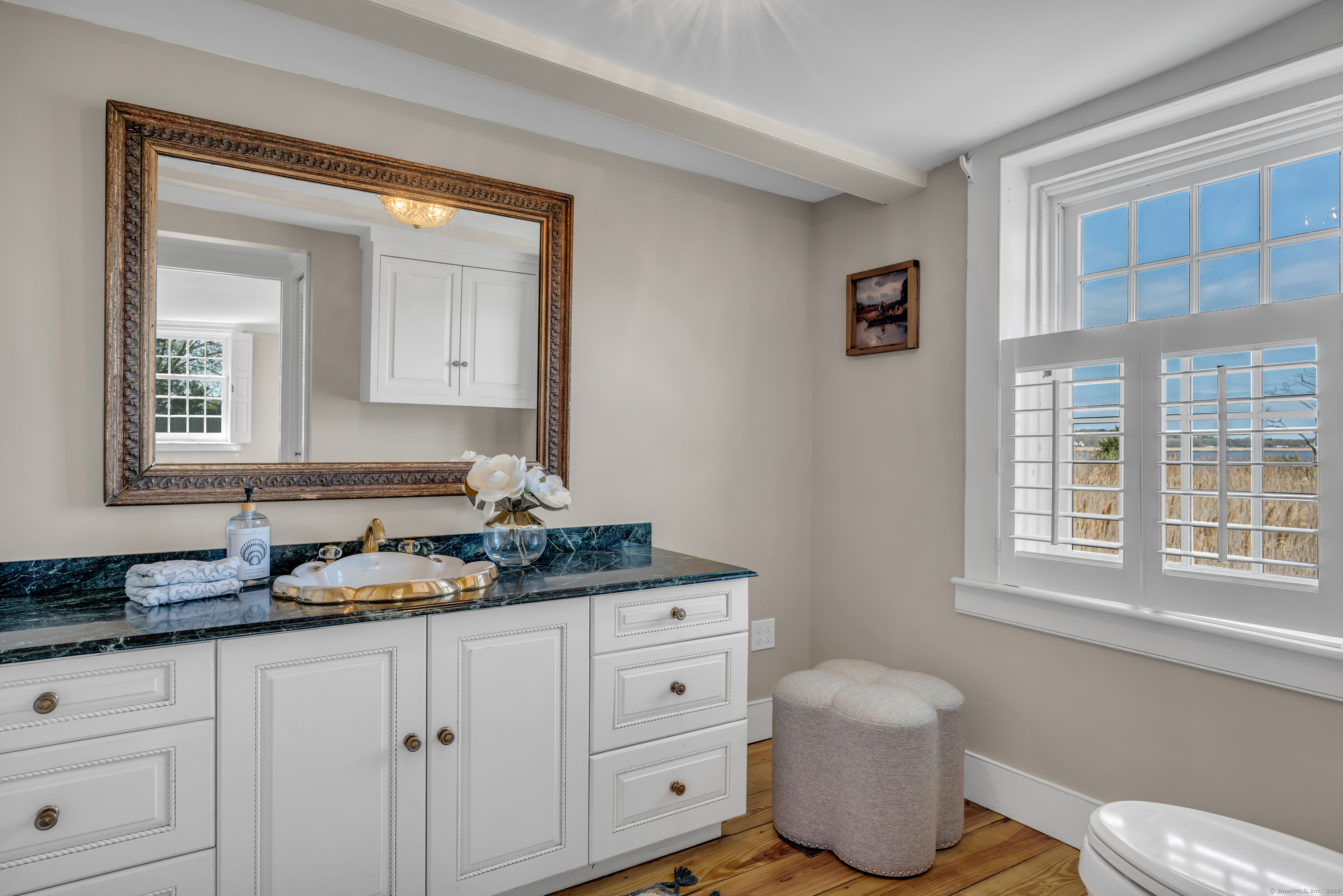 175 North Cove Road Old Saybrook, CT 06475 - Photo 21 of 40 a bathroom with a granite countertop sink toilet and mirror