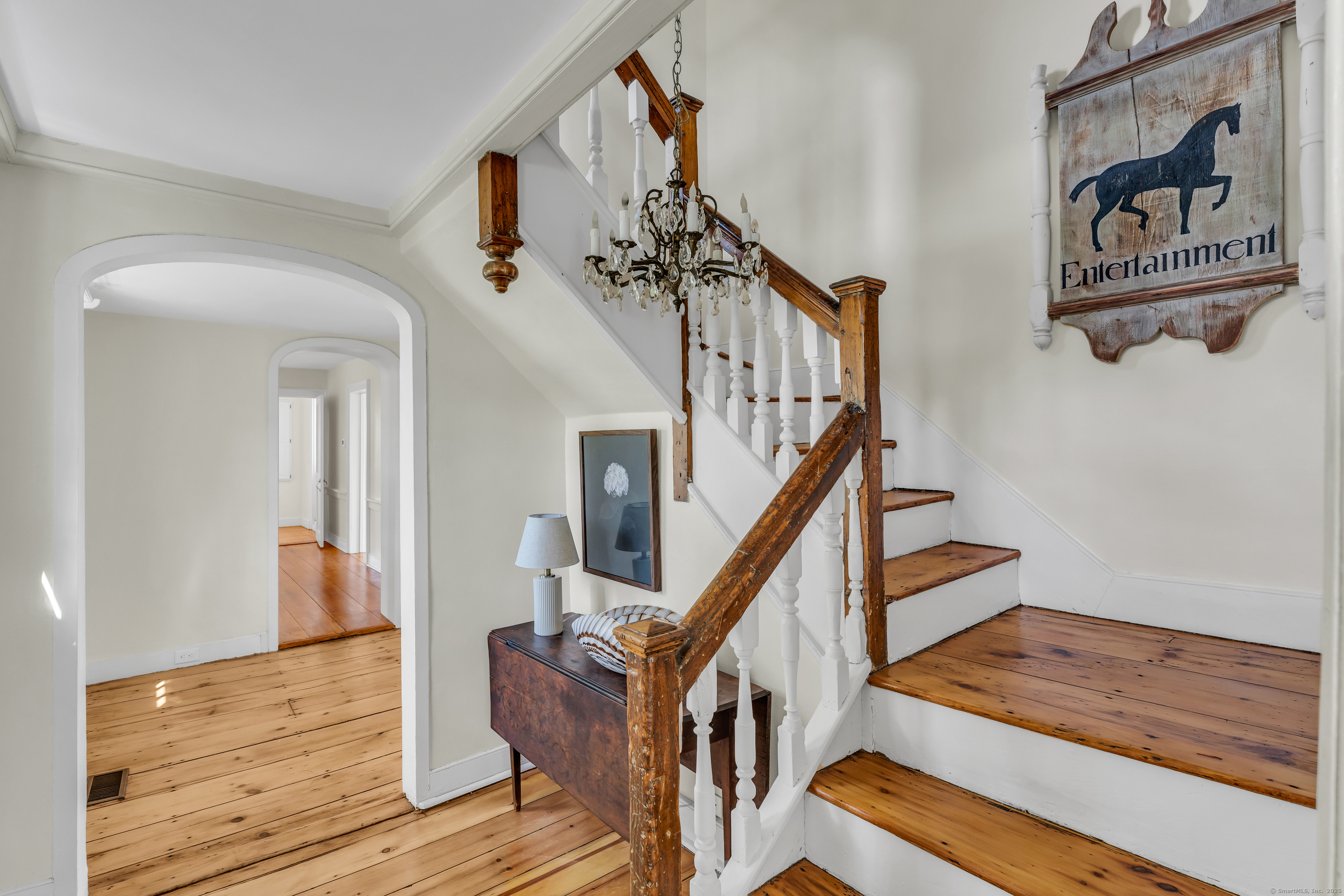 175 North Cove Road Old Saybrook, CT 06475 - Photo 22 of 40 a view of staircase with wooden floor and stairs
