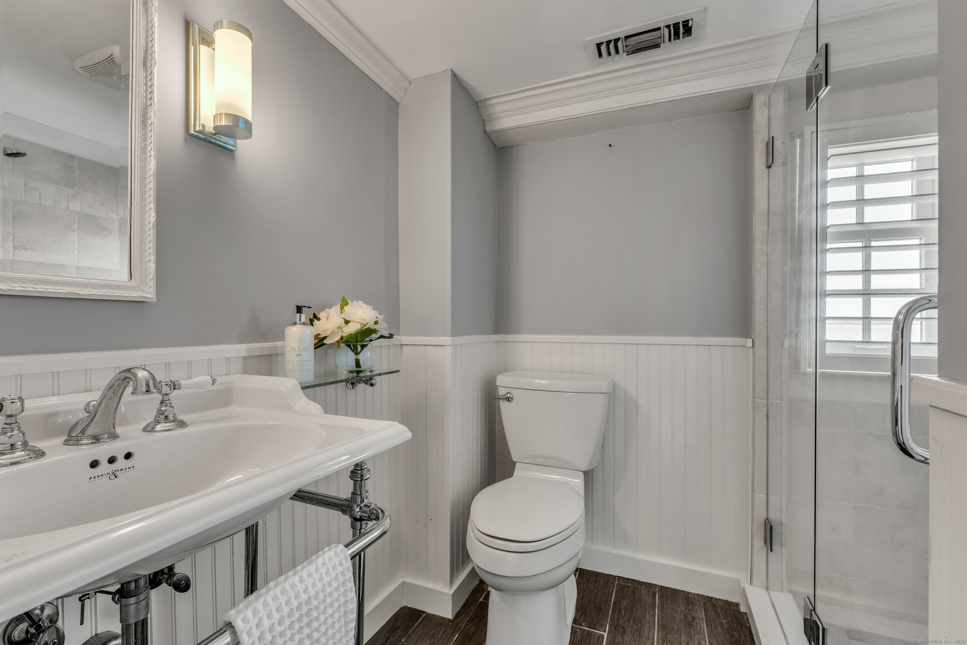 175 North Cove Road Old Saybrook, CT 06475 - Photo 28 of 40 a bathroom with a sink and a toilet