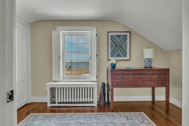 a view of a outdoor sitting area with furniture and backyard