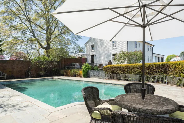 a view of swimming pool with a garden