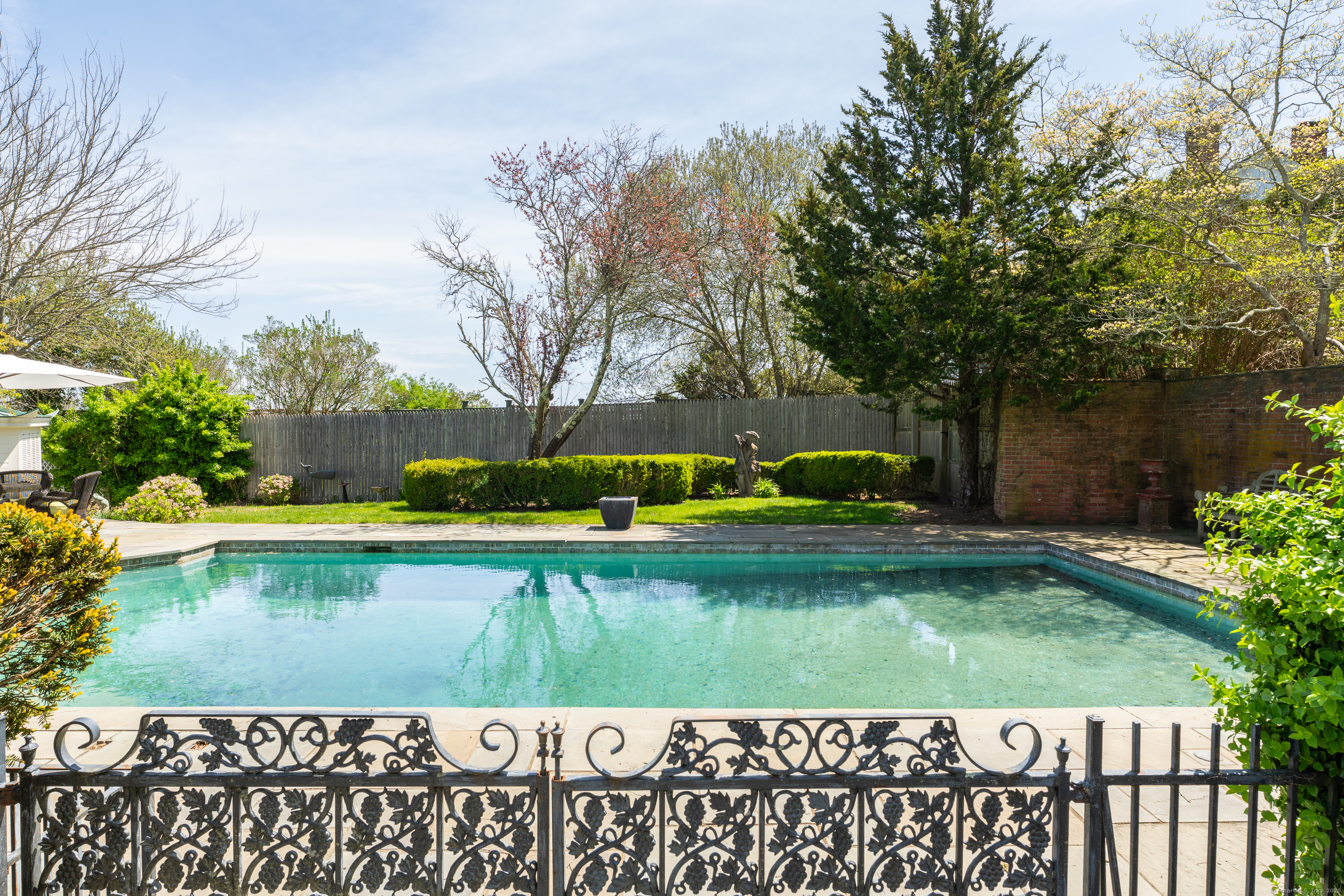 175 North Cove Road Old Saybrook, CT 06475 - Photo 35 of 40 a view of swimming pool with a garden