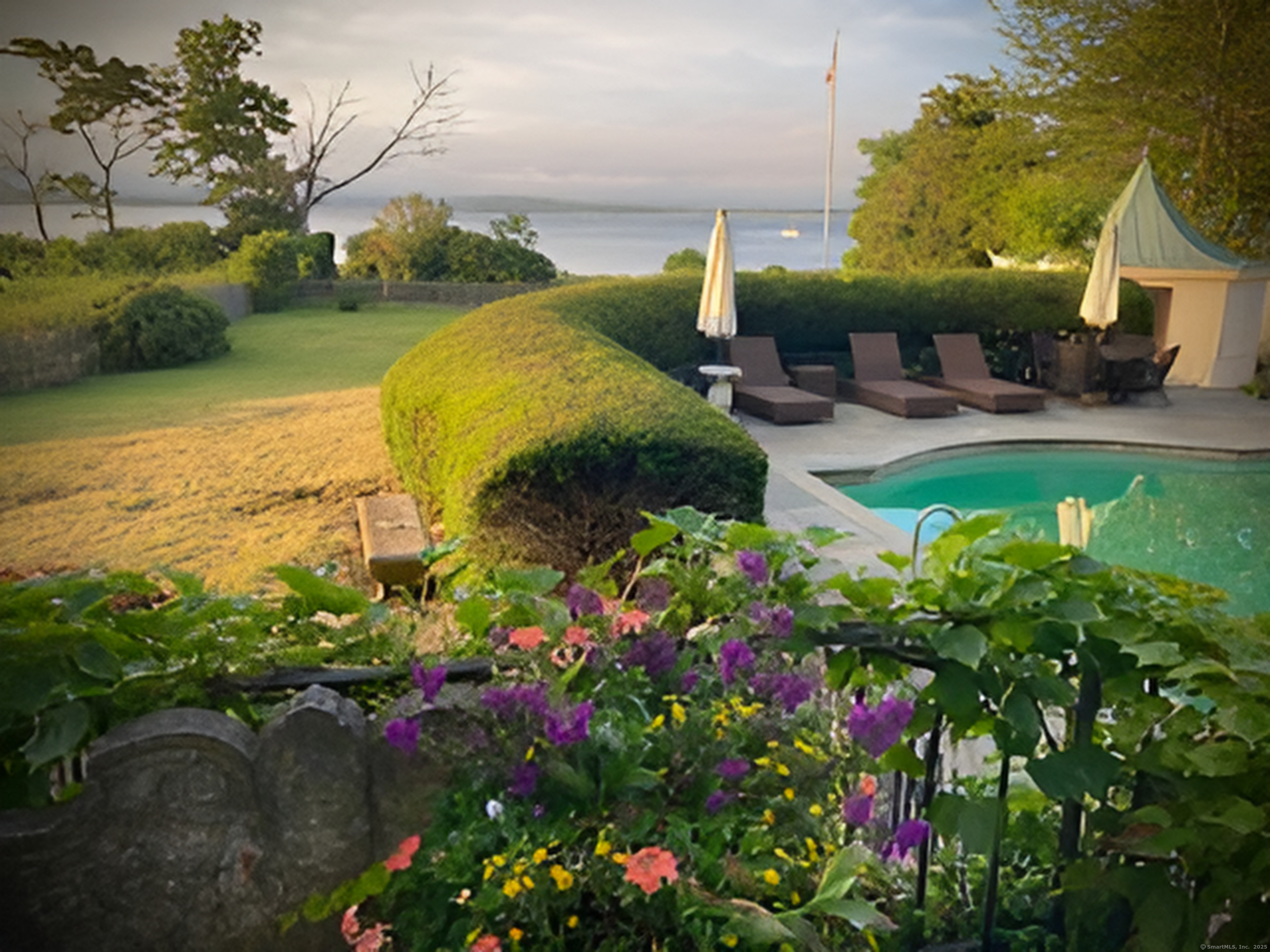 175 North Cove Road Old Saybrook, CT 06475 - Photo 37 of 40 a view of a garden with a fountain