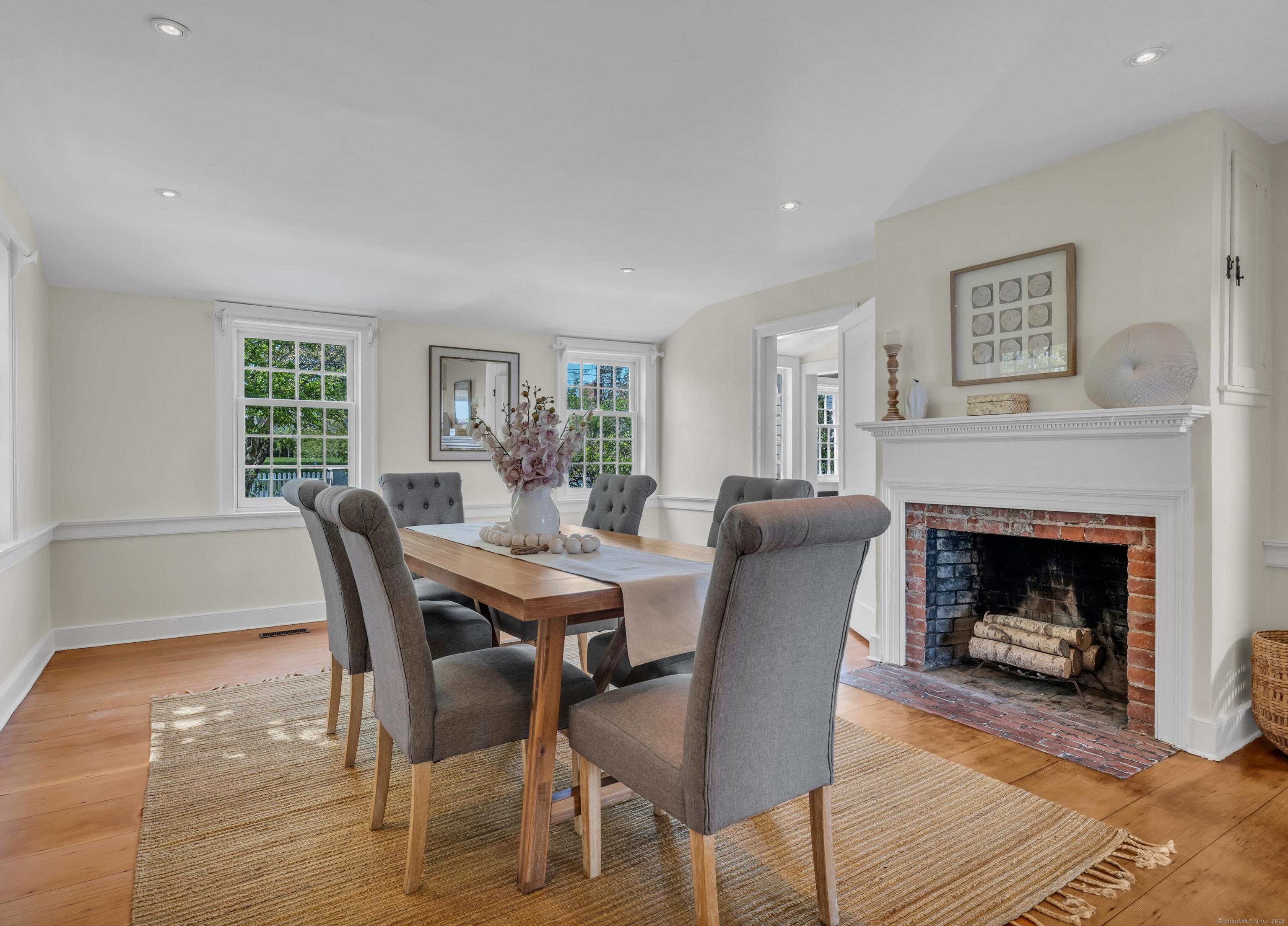 175 North Cove Road Old Saybrook, CT 06475 - Photo 7 of 40 a view of a dining room with furniture window and wooden floor