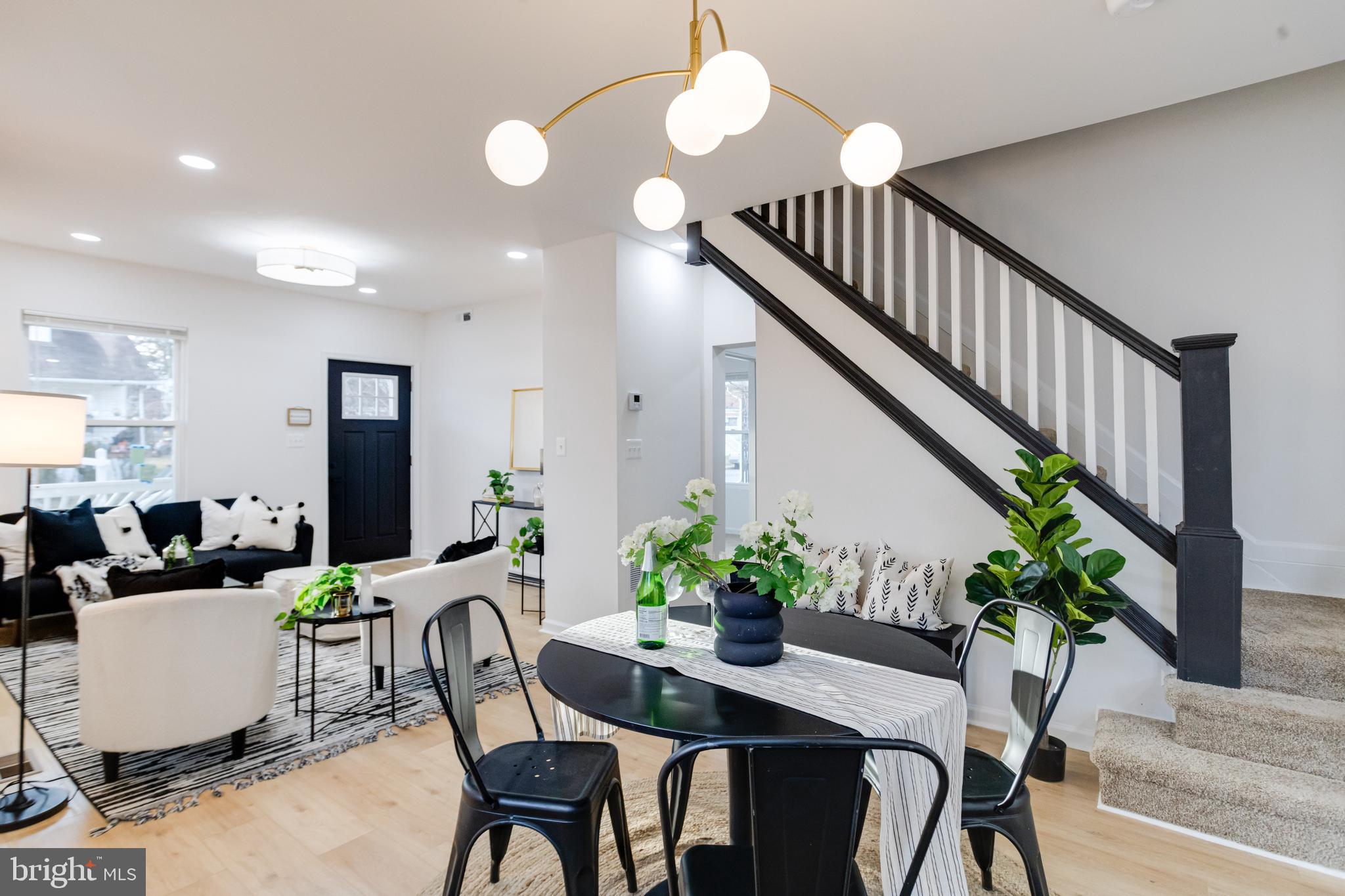 5805 Highgate Drive Baltimore, MD 21215 - Photo 15 of 69 a view of a dining room with furniture window and wooden floor
