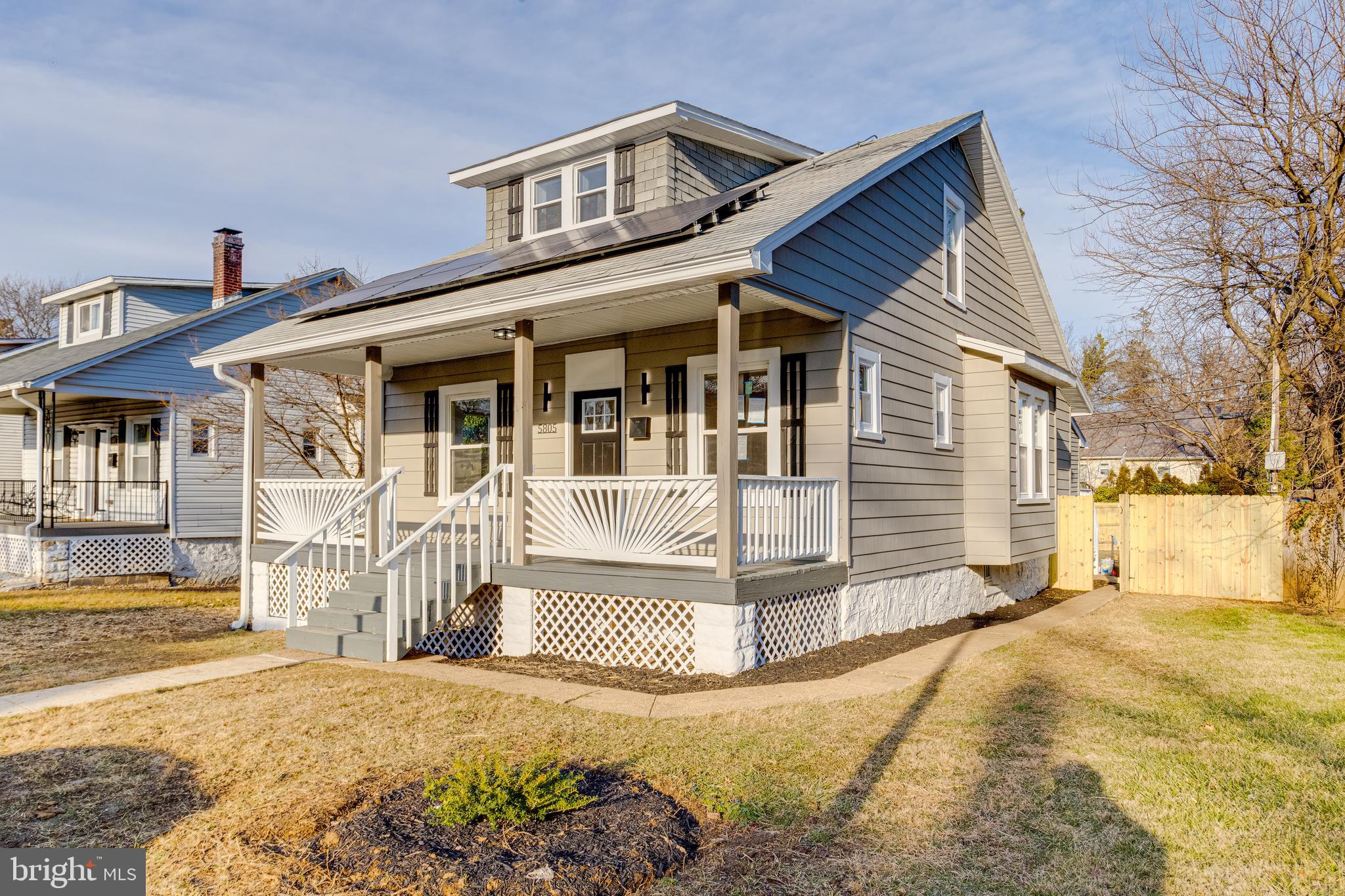 5805 Highgate Drive Baltimore, MD 21215 - Photo 3 of 69 a front view of a house with a patio