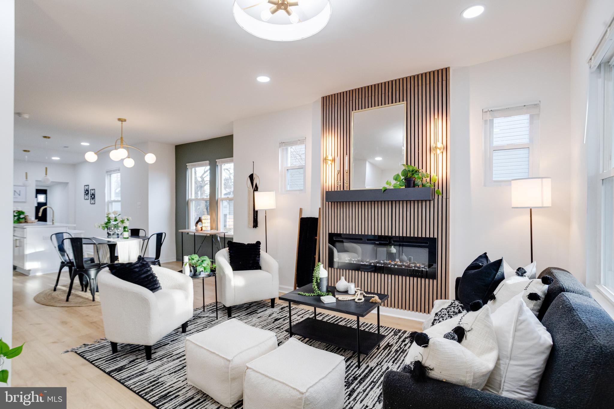 5805 Highgate Drive Baltimore, MD 21215 - Photo 6 of 69 a living room with furniture and a fireplace