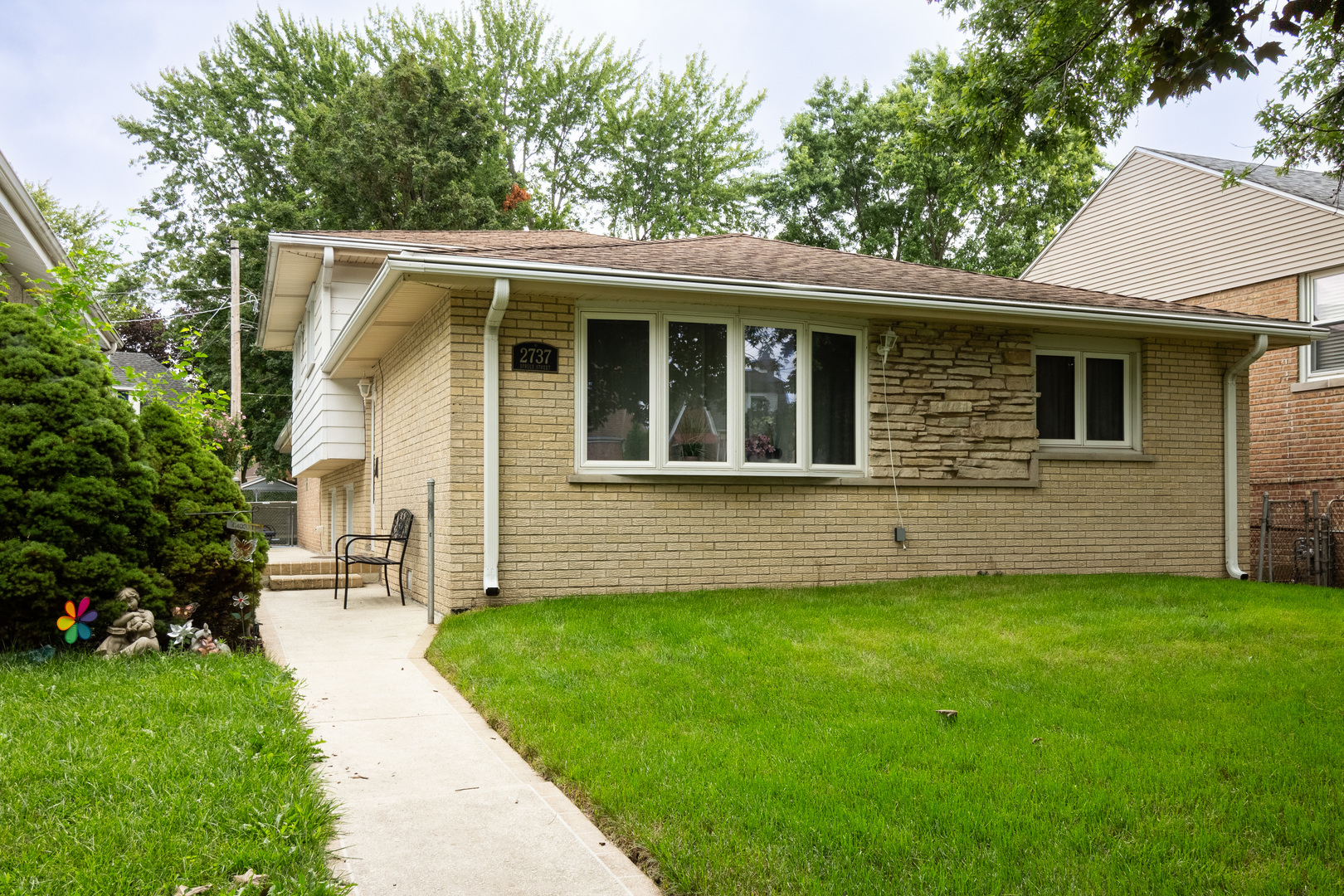 2737 Spruce Street River Grove, IL 60171 - Photo 1 of 30 a front view of house with yard