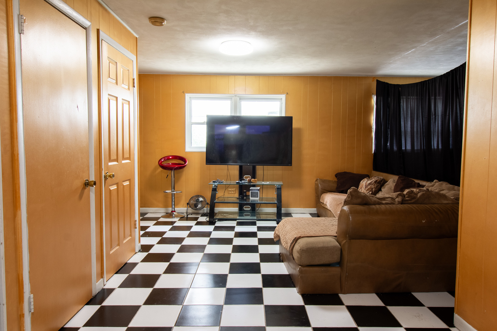 2737 Spruce Street River Grove, IL 60171 - Photo 17 of 30 a living room with furniture and a flat screen tv