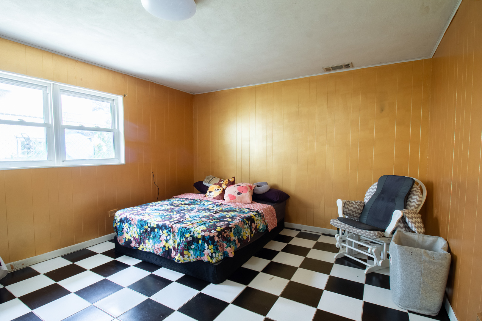 2737 Spruce Street River Grove, IL 60171 - Photo 19 of 30 a bedroom with a bed and a window