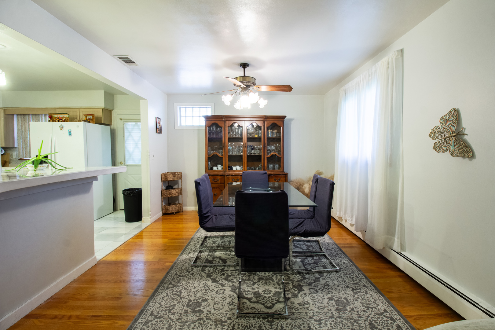 2737 Spruce Street River Grove, IL 60171 - Photo 10 of 30 a view of a dining room with furniture window and wooden floor