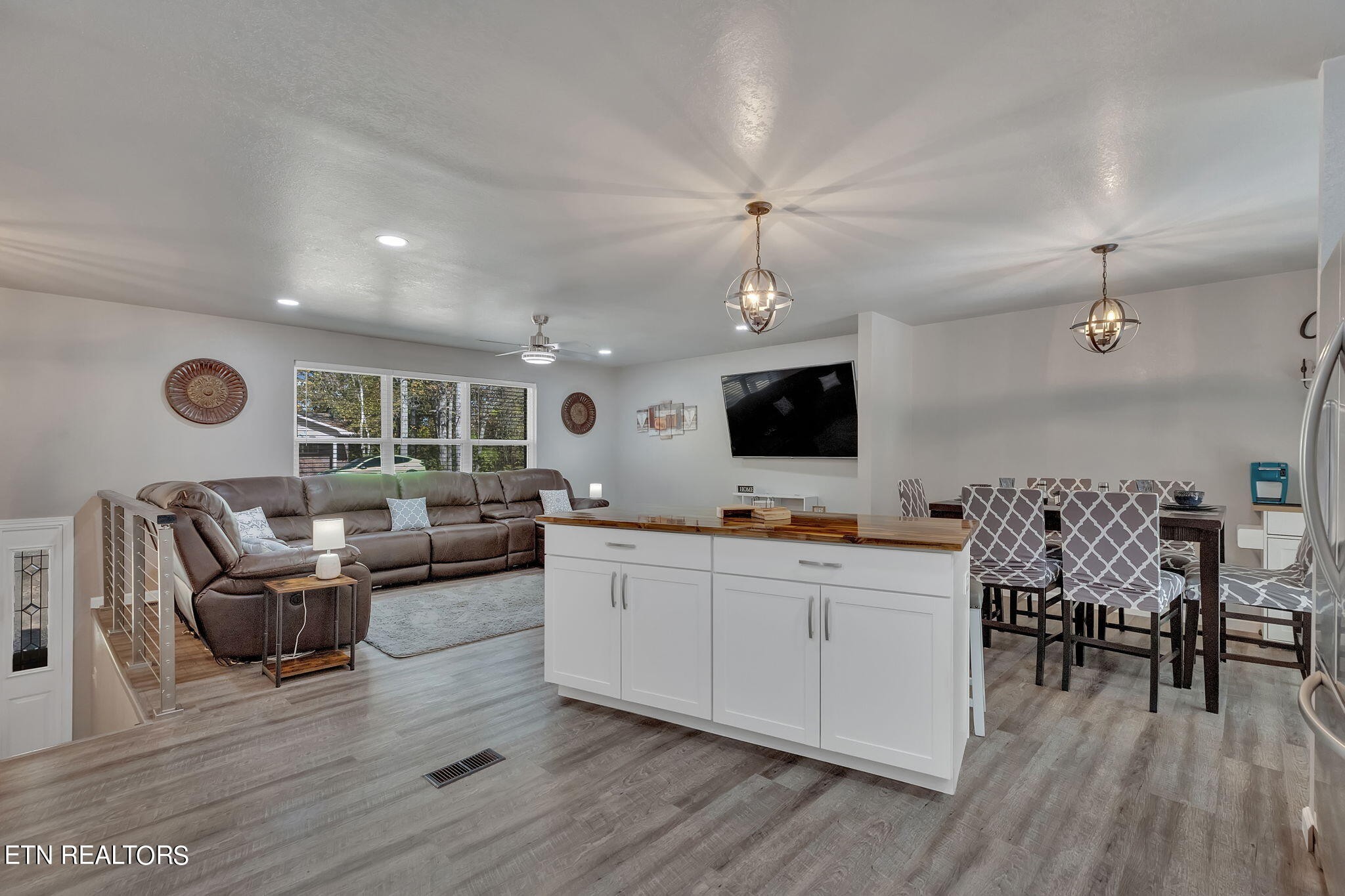 3236 Shagbark Road Powell, TN 37849 - Photo 8 of 39 a living room with furniture and a flat screen tv