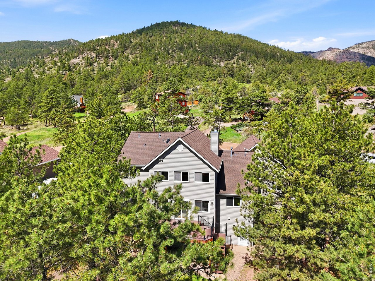 256 Choctaw Road Lyons, CO 80540 - Photo 45 of 50 a house with a tree in the background