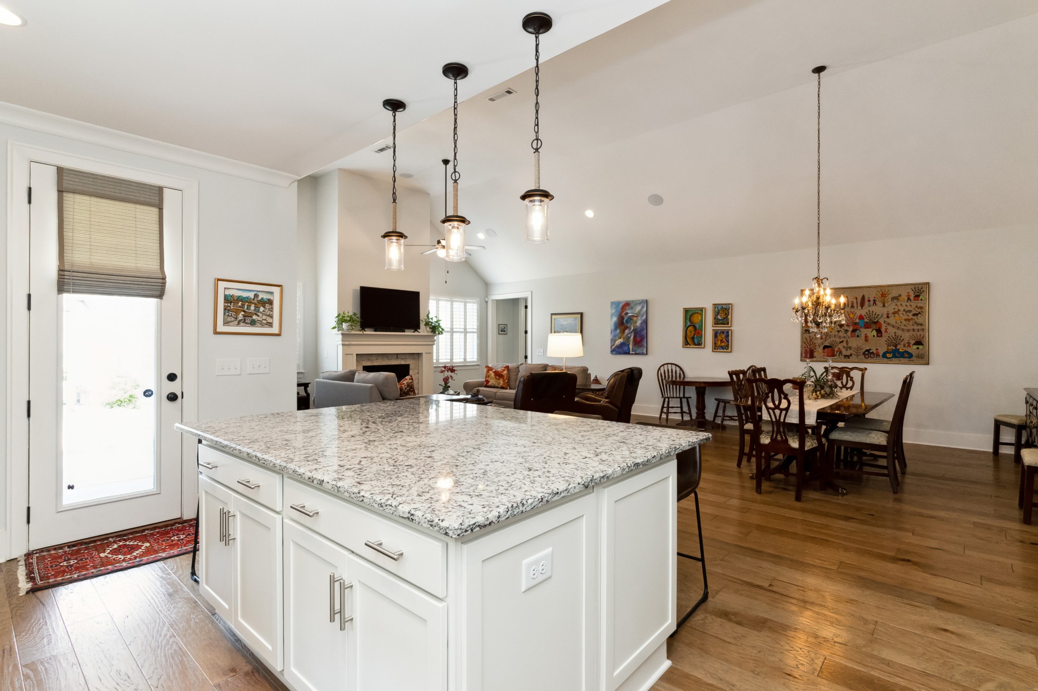 114 Vanner Road Mount Juliet, TN 37122 - Photo 12 of 39 a view of a kitchen counter top space with furniture and wooden floor