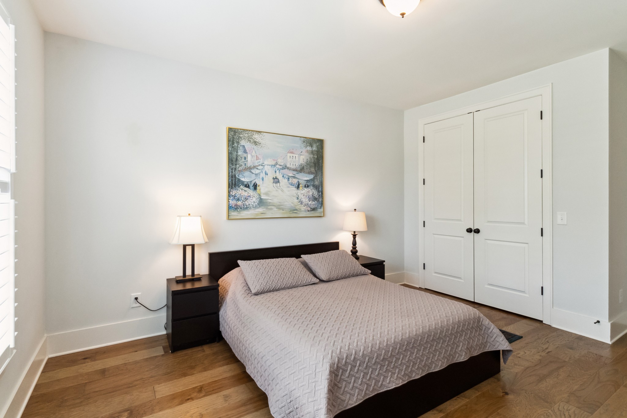 114 Vanner Road Mount Juliet, TN 37122 - Photo 16 of 39 a bedroom with a bed and painting on the wall
