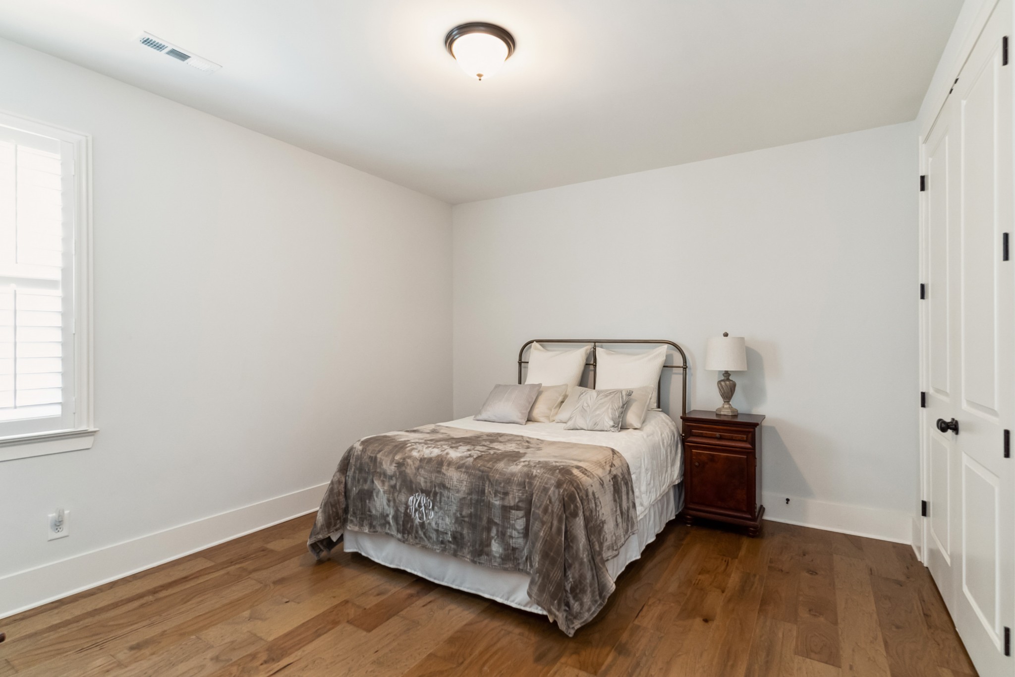 114 Vanner Road Mount Juliet, TN 37122 - Photo 18 of 39 a bedroom with a bed and a window