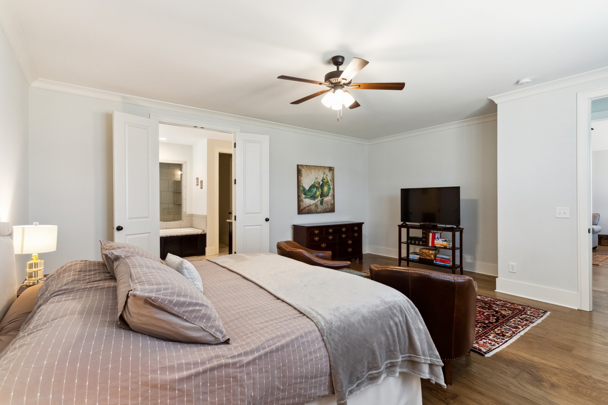 114 Vanner Road Mount Juliet, TN 37122 - Photo 23 of 39 a bedroom with a bed and a flat screen tv