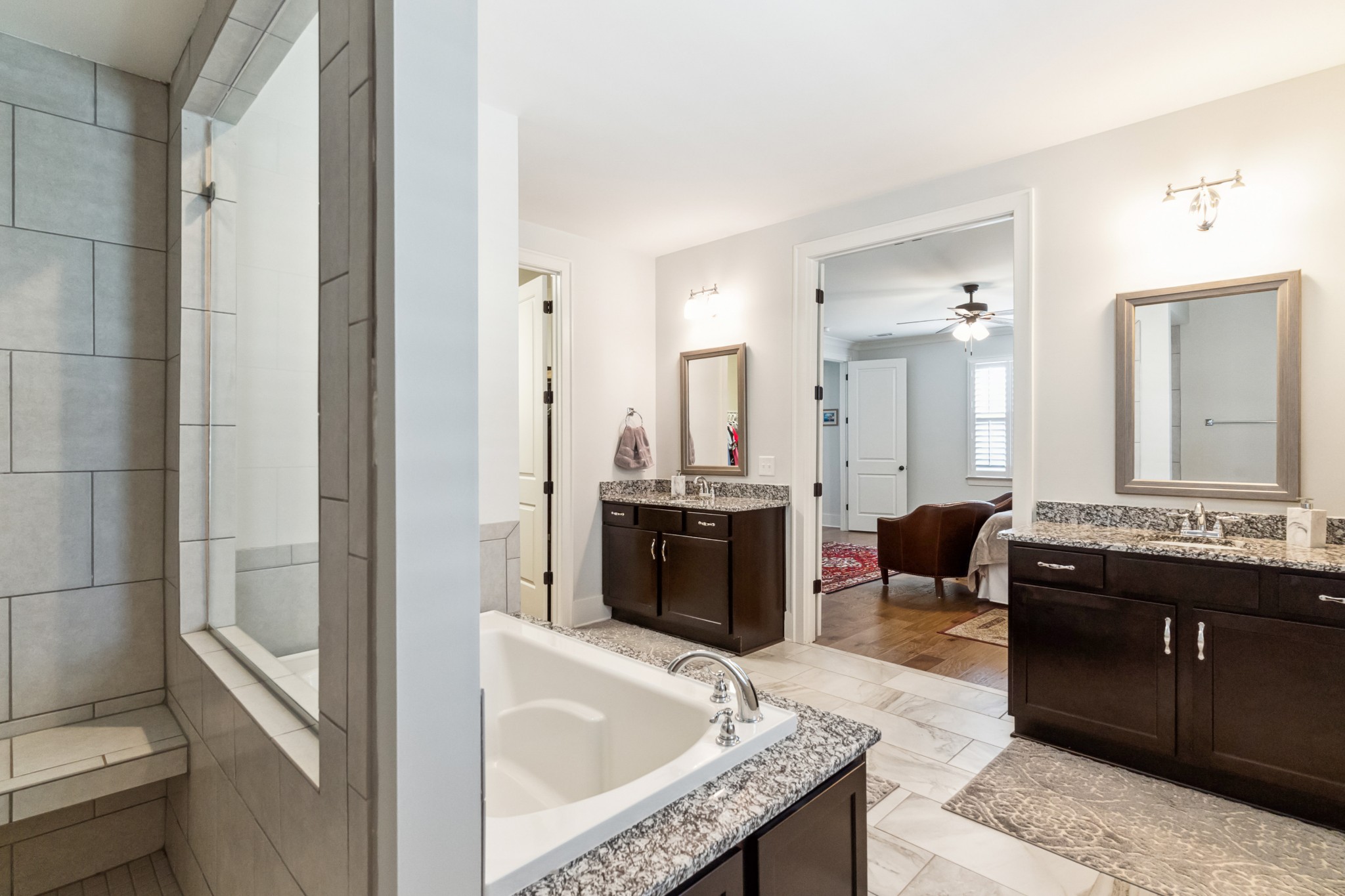 114 Vanner Road Mount Juliet, TN 37122 - Photo 24 of 39 a large spacious bathroom with a granite countertop tub double vanity and sink