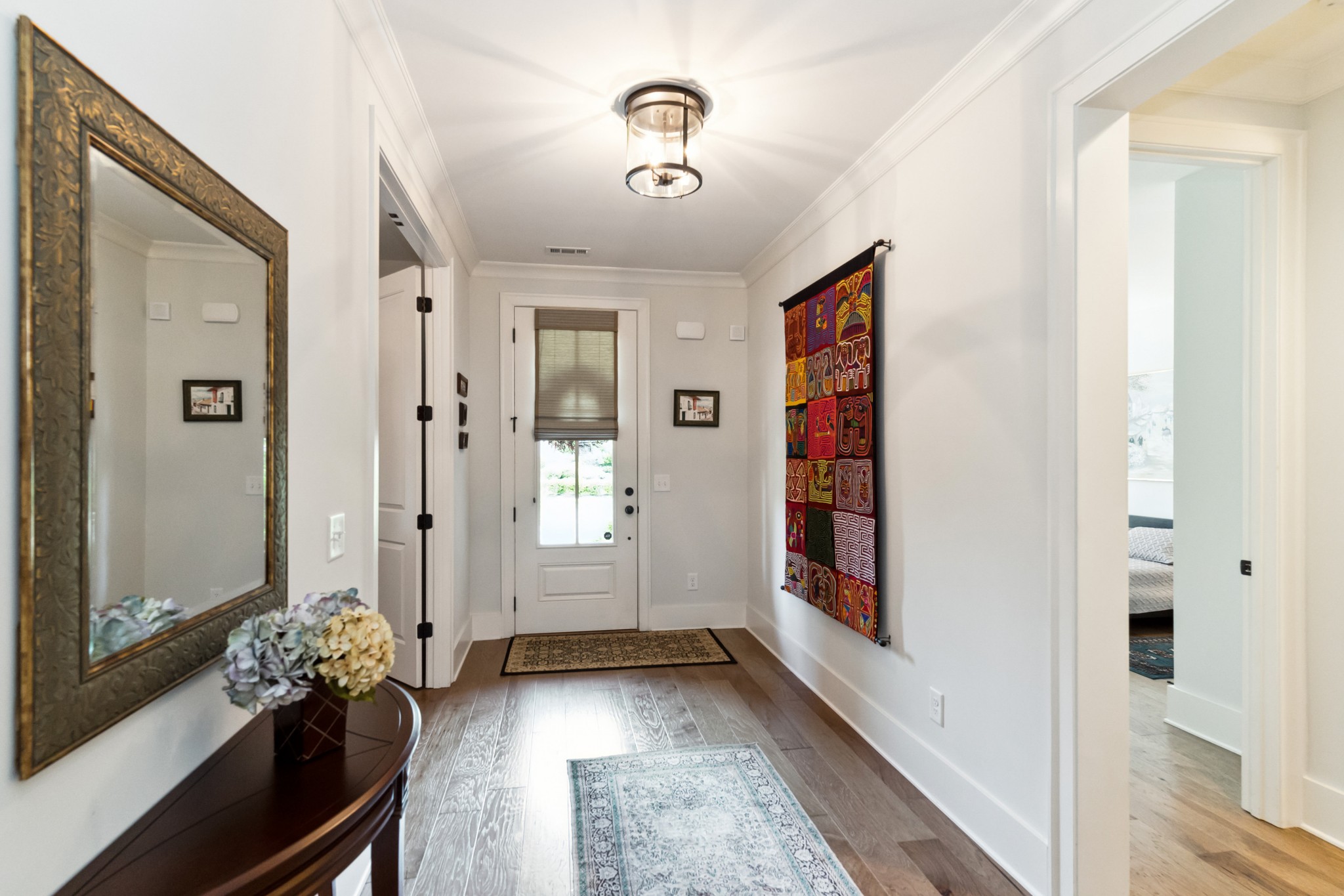 114 Vanner Road Mount Juliet, TN 37122 - Photo 5 of 39 a view of a hallway to a livingroom with furniture
