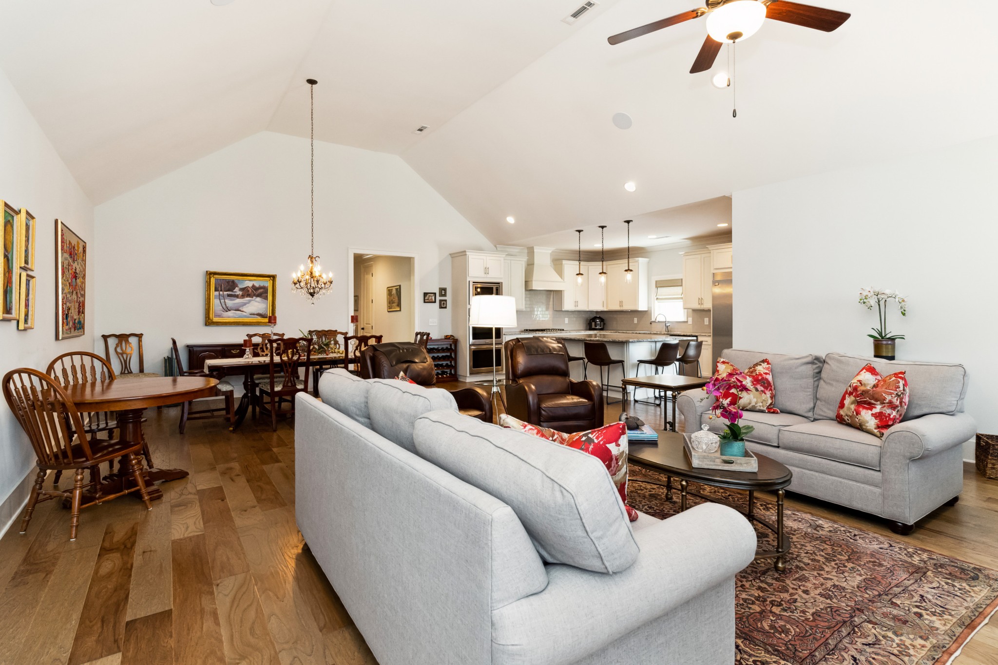 114 Vanner Road Mount Juliet, TN 37122 - Photo 8 of 39 a living room with furniture kitchen view and a chandelier