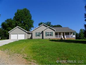 232 Long Road Bostic, NC 28018 - Photo 1 of 12 a front view of a house with yard