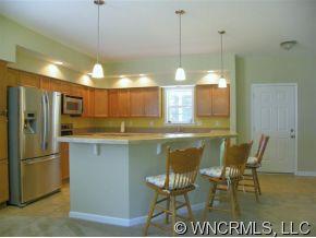 232 Long Road Bostic, NC 28018 - Photo 10 of 12 a kitchen with a table and chairs in it