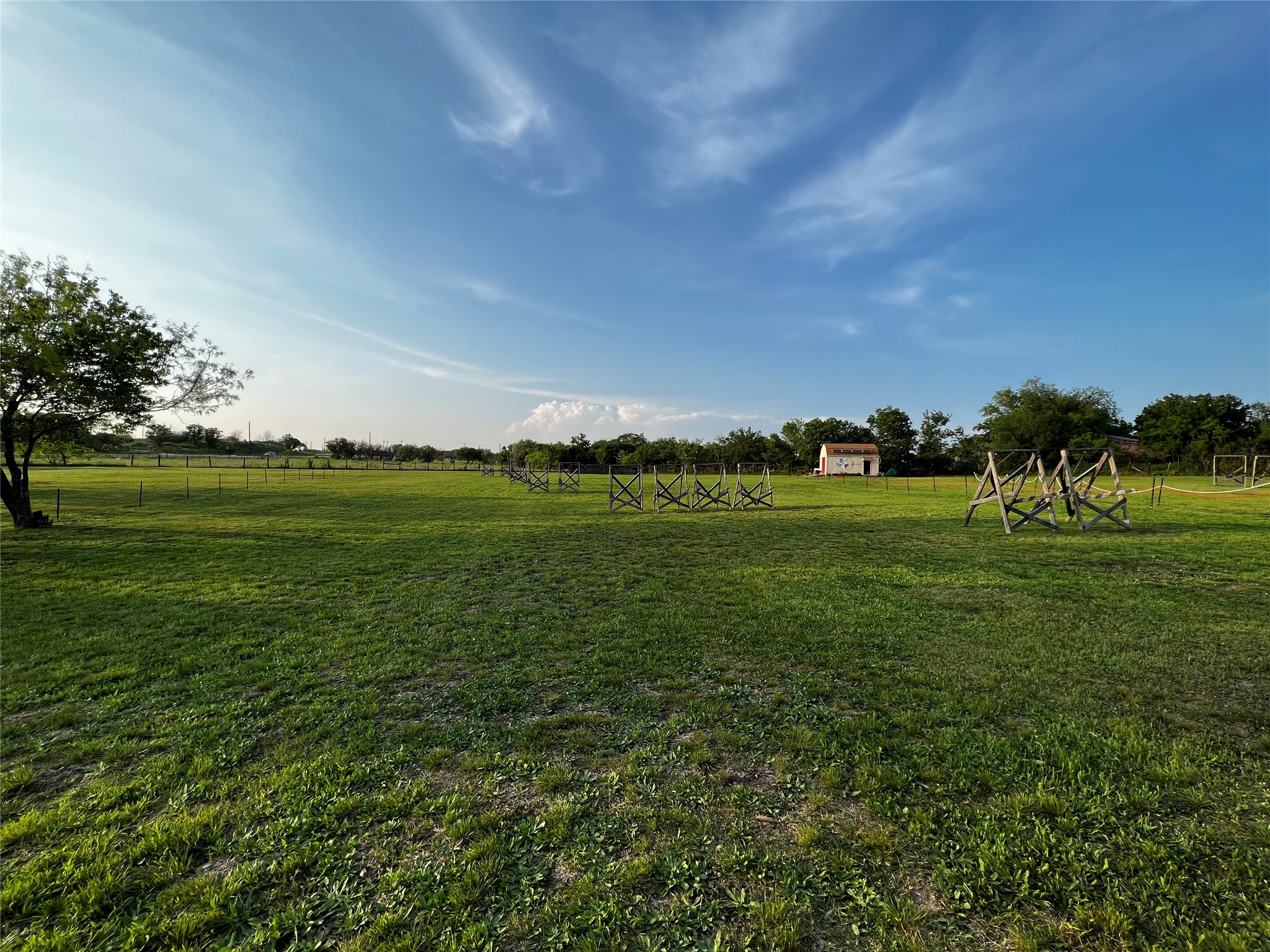 5400 East Howard Lane Manor, TX 78653 - Photo 1 of 5 a view of a golf course with a lake