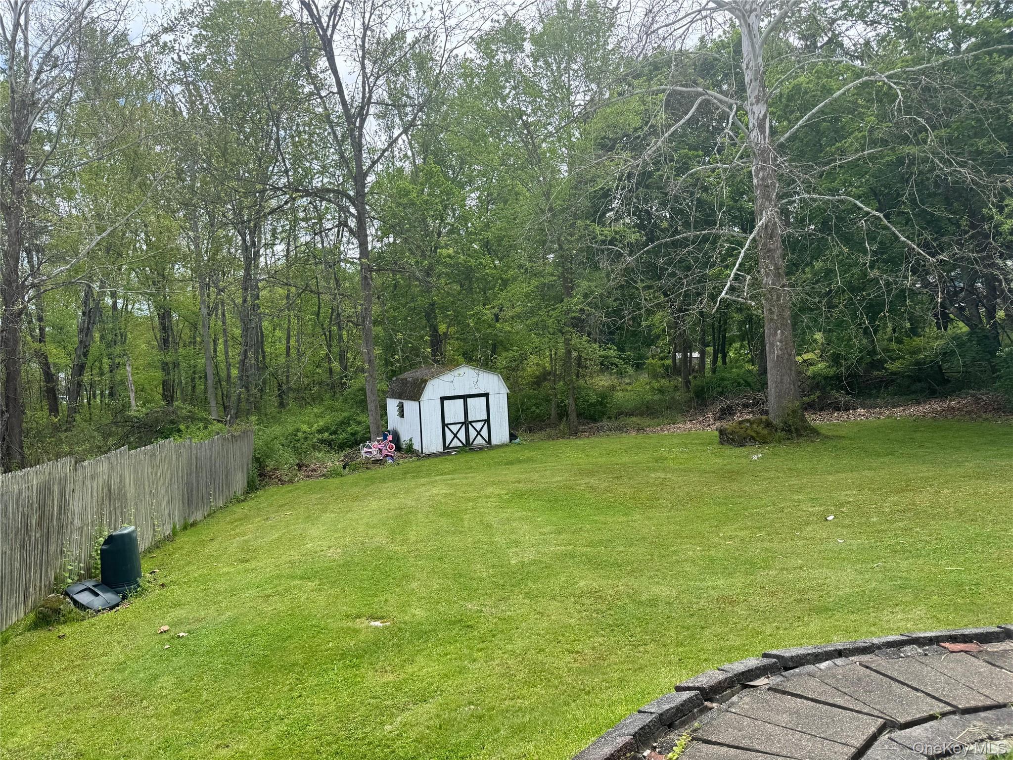 176 Spackenkill Road, Unit 1B Poughkeepsie, NY 12603 - Photo 5 of 7 a view of a trees with a yard