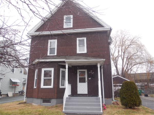 38 Whitman Street Chicopee, MA 01013 - Photo 1 of 15 a view of a house with a yard