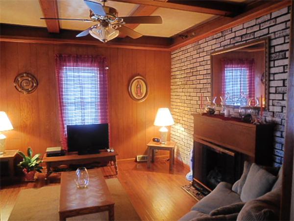 38 Whitman Street Chicopee, MA 01013 - Photo 3 of 15 a view of a livingroom with furniture and a flat screen tv
