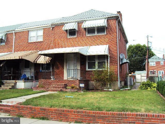 111 Riverthorn Road Baltimore, MD 21220 - Photo 1 of 1 a view of a house with a yard