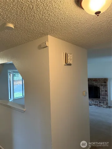 a kitchen with a sink cabinets and appliances