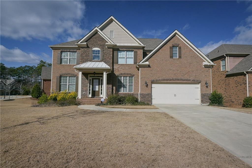 7790 Stratford Lane Atlanta, GA 30350 - Photo 1 of 1 front view of a house with a yard