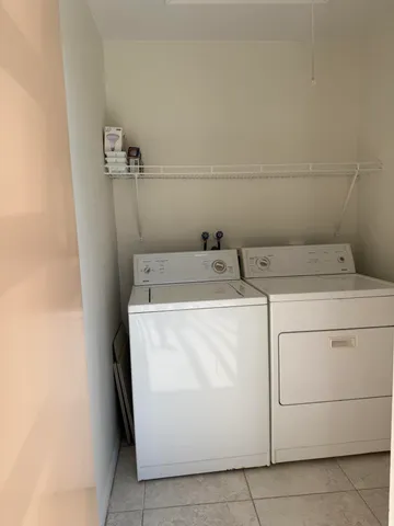 a bathroom with a shower and a toilet
