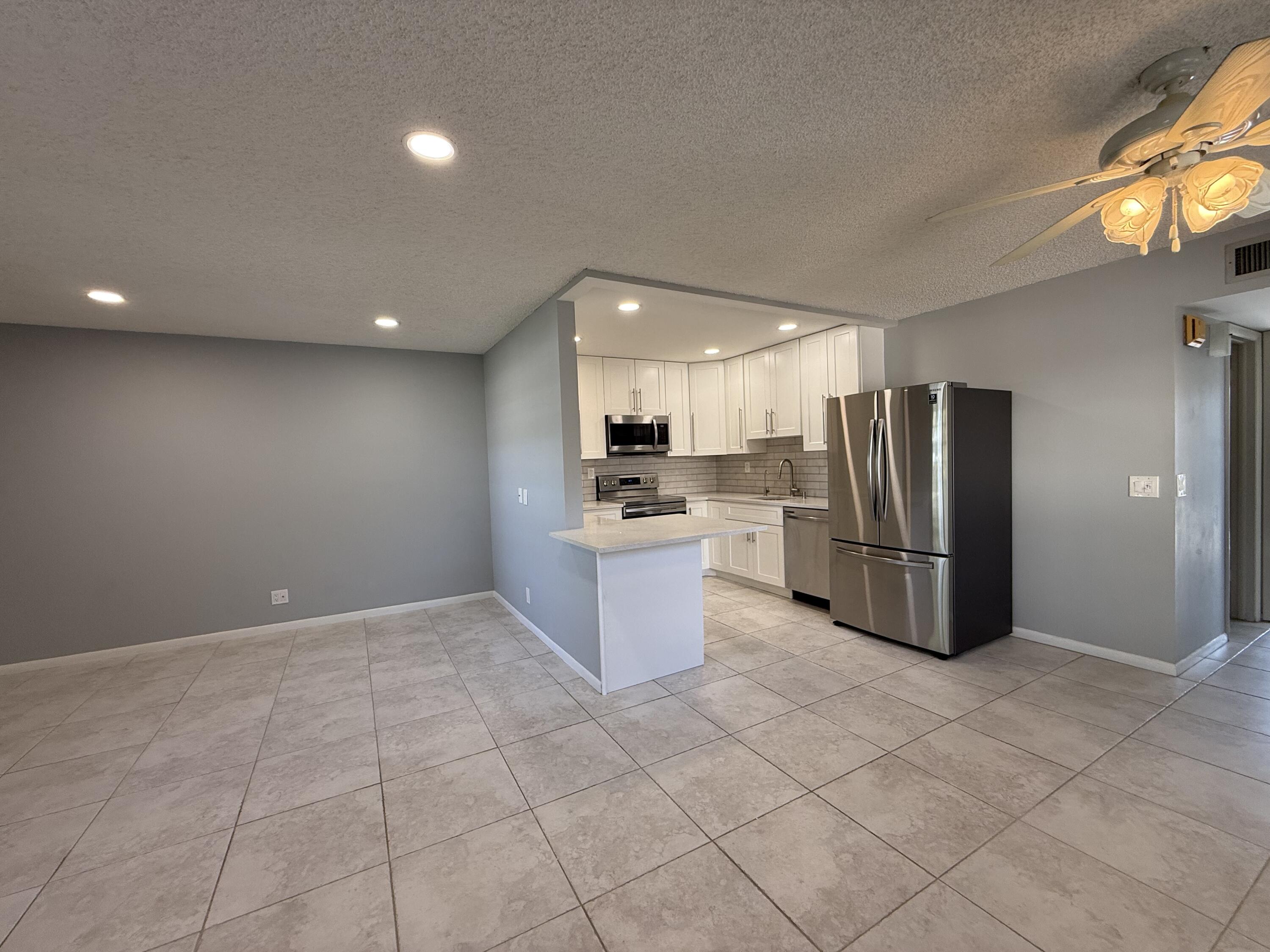 855 Normandy Trail, Unit 855 Delray Beach, FL 33484 - Photo 6 of 14 OPEN KITCHEN