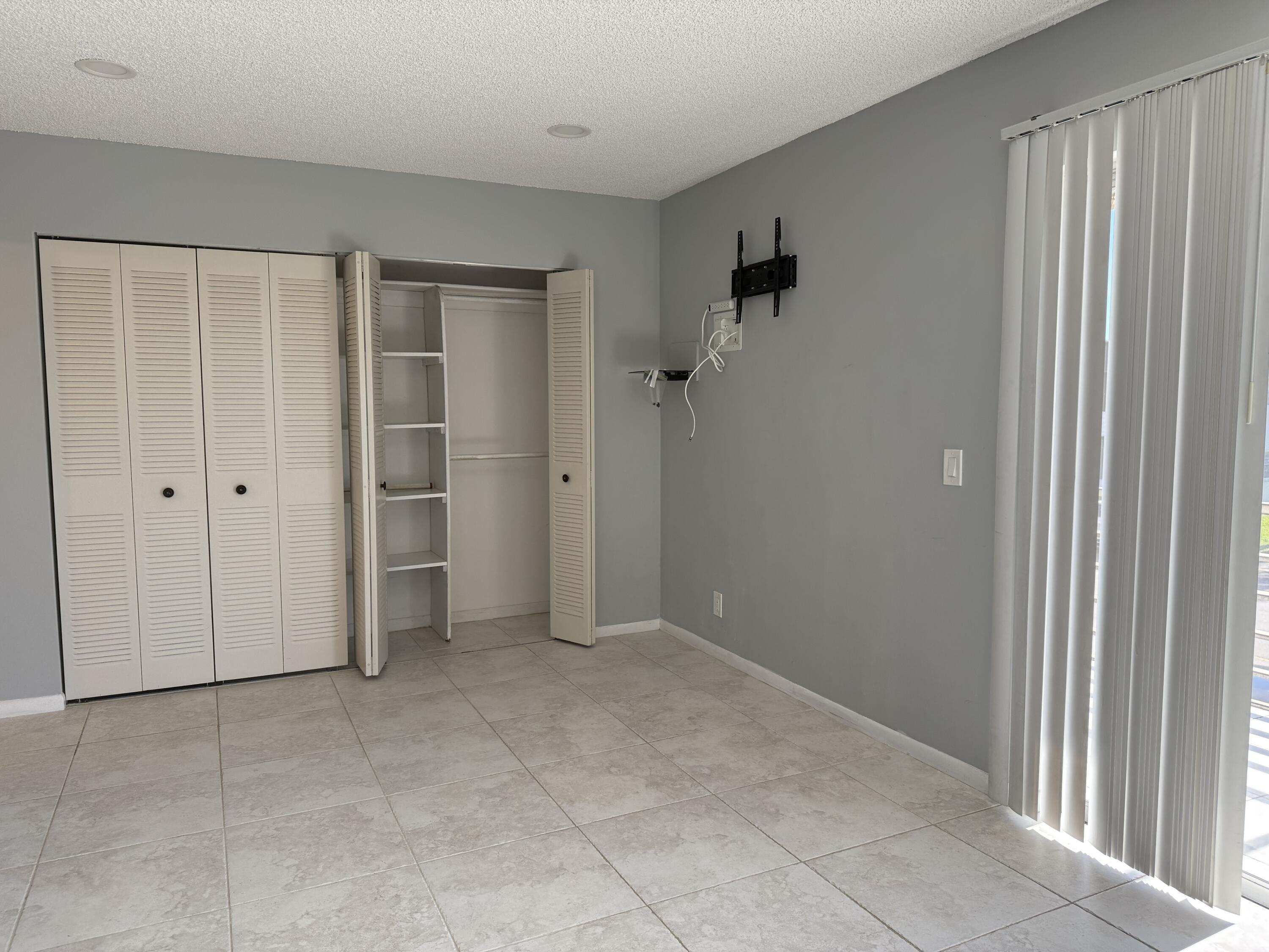 855 Normandy Trail, Unit 855 Delray Beach, FL 33484 - Photo 9 of 14 MAIN BEDROOM