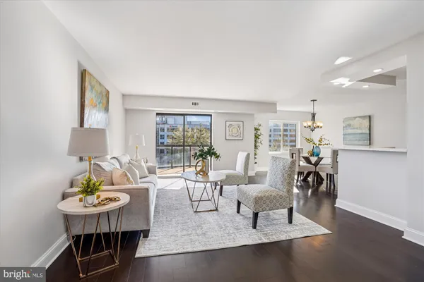 a living room with furniture and a table