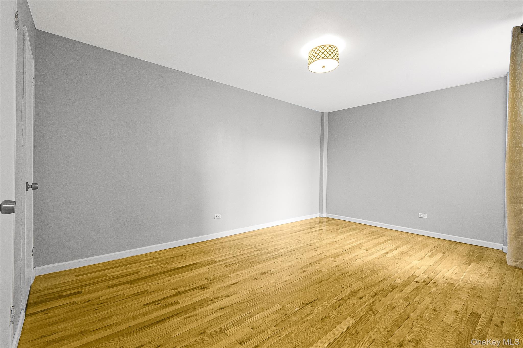 67-30 Clyde Street, Unit 6W Queens, NY 11375 - Photo 26 of 32 a view of an empty room