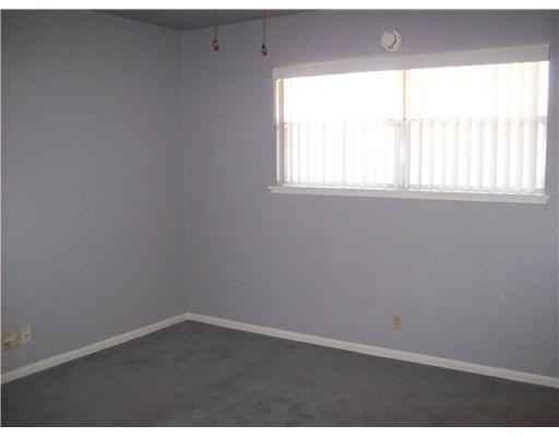 5821 Limerick Drive Corpus Christi, TX 78413 - Photo 3 of 5 an empty room with a window