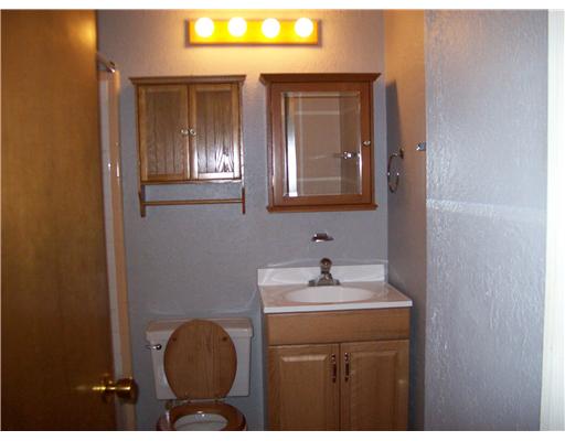 5821 Limerick Drive Corpus Christi, TX 78413 - Photo 4 of 5 a bathroom with a sink and a mirror