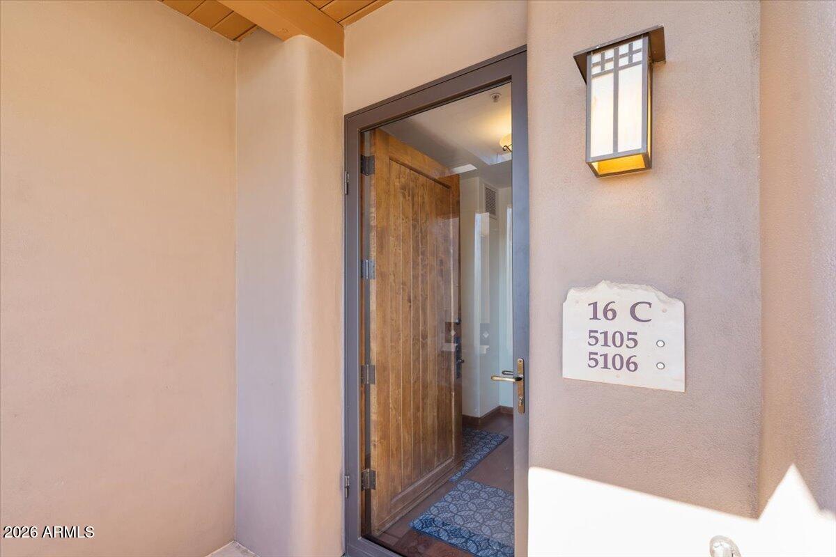 36601 North Mule Train Road, Unit C16 Carefree, AZ 85377 - Photo 7 of 38 a view of a hallway with elevator