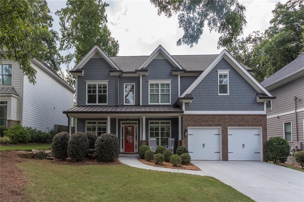 Gorgeous newer construction home in amazing Midway Woods neighborhood with 5 beds and 4 baths.