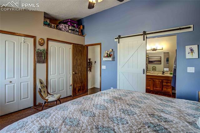 1330 Ride Lane Colorado Springs, CO 80916 - Photo 21 of 48 Primary Bedroom Suite