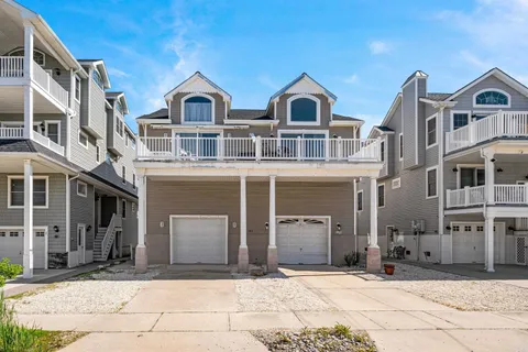 a front view of a house with yard